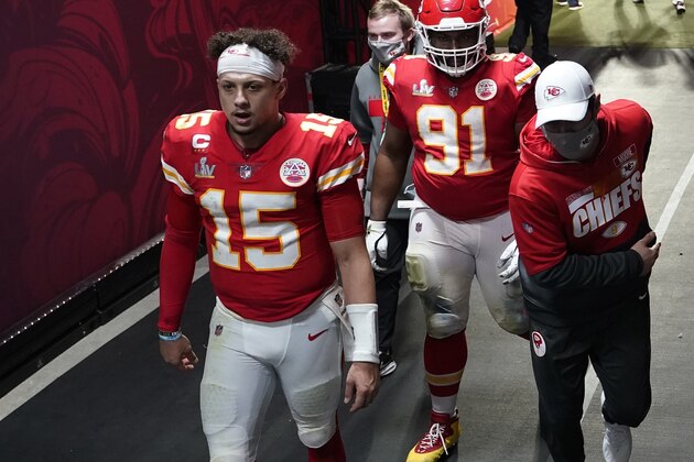 Kansas City Chiefs quarterback Patrick Mahomes (15) walks to the locker room following NFL Super Bowl 55 football game against the Tampa Bay Buccaneers Sunday, Feb. 7, 2021, in Tampa, Fla. The Buccaneers defeated the Chiefs 31-9 to win the Super Bowl. (AP Photo/David J. Phillip)