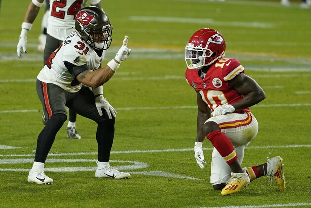 Tampa Bay Buccaneers strong safety Antoine Winfield Jr. taunts Kansas City Chiefs wide receiver Tyreek Hill after a play during the second half of the NFL Super Bowl 55 football game Sunday, Feb. 7, 2021, in Tampa, Fla. (AP Photo/Mark Humphrey)