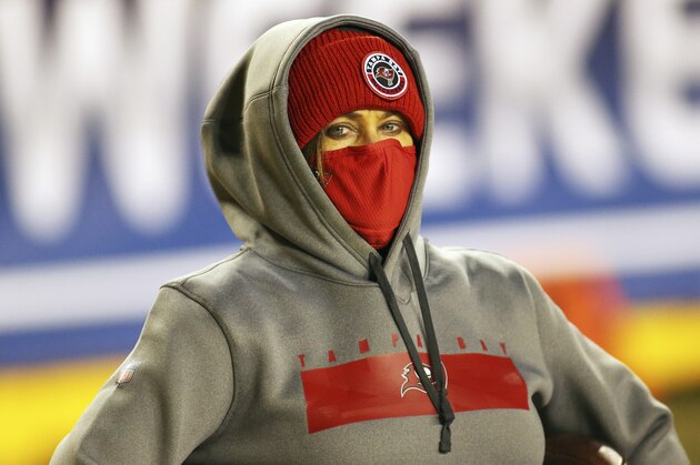 FILE - In this Jan. 9, 2021, file photo, Tampa Bay Buccaneers assistant defensive line coach Lori Locust looks on before an NFL wild-card playoff football game against the Washington Football Team in Landover, Md. Maral Javadifar, assistant strength and conditioning coach, and Locust follow in Katie Sowers' footsteps with the Bucs the only NFL team with two female coaches this season. (AP Photo/Daniel Kucin Jr., File)