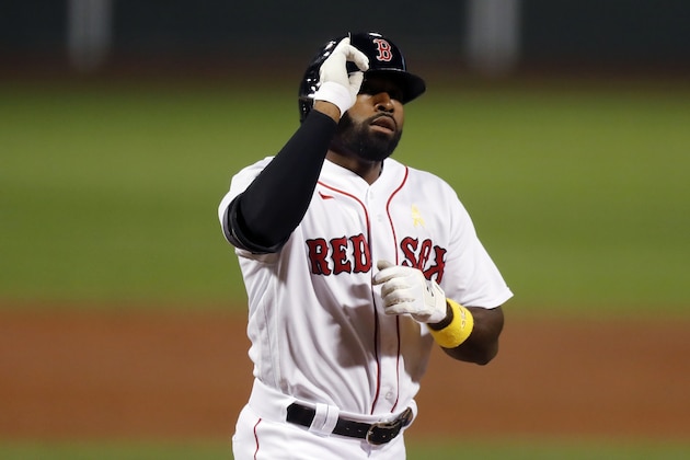 Boston Red Sox's Jackie Bradley Jr. celebrates his two-run home run during the second inning of a baseball game against the Toronto Blue Jays, Saturday, Sept. 5, 2020, in Boston. (AP Photo/Michael Dwyer)