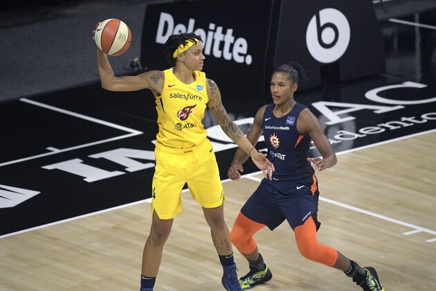 Indiana Fever forward Candice Dupree (4) sets up in front of Connecticut Sun forward Alyssa Thomas during the second half of a WNBA basketball game, Tuesday, Aug. 18, 2020, in Bradenton, Fla. (AP Photo/Phelan M. Ebenhack)