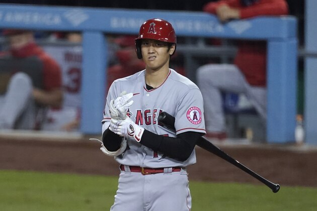 Los Angeles Angels designated hitter Shohei Ohtani reacts to a strike during the sixth inning of the team's baseball game against the Los Angeles Dodgers on Saturday, Sept. 26, 2020, in Los Angeles. (AP Photo/Ashley Landis)