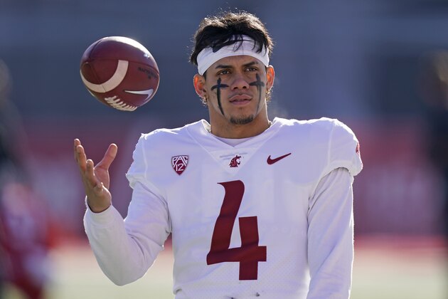 Washington State quarterback Jayden de Laura (4) warms up before an NCAA college football game against Utah, Saturday, Dec. 19, 2020, in Salt Lake City. (AP Photo/Rick Bowmer)