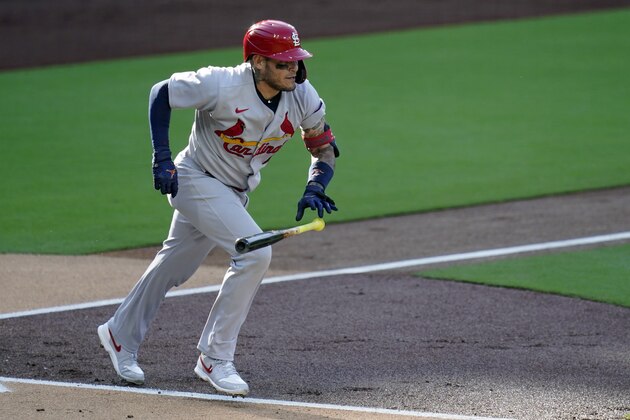 St. Louis Cardinals' Yadier Molina heads to first on an RBI single during the first inning of Game 2 of the team's National League wild-card baseball series against the San Diego Padres, Thursday, Oct. 1, 2020, in San Diego. (AP Photo/Gregory Bull)