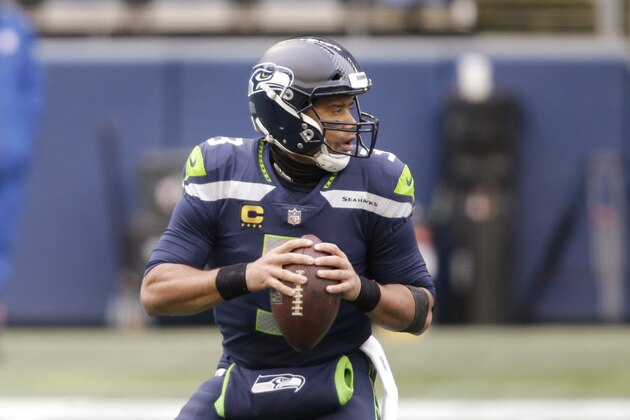 Seattle Seahawks quarterback Russell Wilson in action against the Los Angeles Rams in an NFL wild-card playoff football game, Saturday, Jan. 9, 2021, in Seattle. (AP Photo/Scott Eklund)