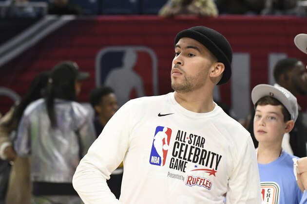Team Wilbon's Bad Bunny warms up before an NBA Celebrity All-Star basketball game against Team Stephen A's in an NBA Celebrity All-Star basketball game Friday, Feb. 14, 2020, in Chicago. (AP Photo/David Banks)
