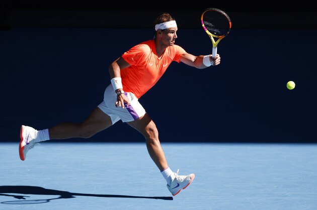 Spain's Rafael Nadal makes a forehand return to Serbia's Laslo Djere during their first round match at the Australian Open tennis championship in Melbourne, Australia, Tuesday, Feb. 9, 2021.(AP Photo/Rick Rycroft) Spain's Rafael Nadal makes a forehand return to Serbia's Laslo Djere during their first round match at the Australian Open tennis championship in Melbourne, Australia, Tuesday, Feb. 9, 2021.(AP Photo/Rick Rycroft)