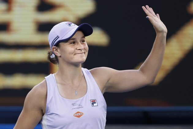 Australia's Ashleigh Barty reacts after defeating Montenegrin's Danke Kovinic during their first round match at the Australian Open tennis championship in Melbourne, Australia, Tuesday, Feb. 9, 2021. (AP Photo/Rick Rycroft)