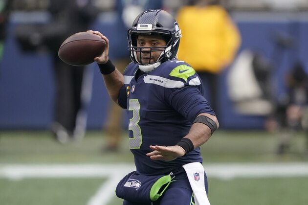 Seattle Seahawks quarterback Russell Wilson (3) in action against the Los Angeles Rams during an NFL wild-card playoff football game, Saturday, Jan. 9, 2021, in Seattle. (AP Photo/Ted S. Warren)