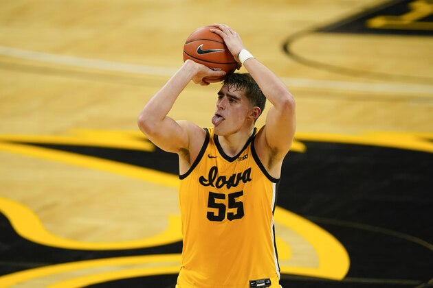 Iowa center Luka Garza shoots during the second half of an NCAA college basketball game against Indiana, Thursday, Jan. 21, 2021, in Iowa City, Iowa. Indiana won 81-69. (AP Photo/Charlie Neibergall)