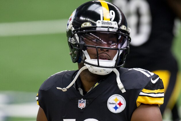 Pittsburgh Steelers wide receiver JuJu Smith-Schuster (19) warms up before an NFL football game against the Dallas Cowboys, Sunday, Nov. 8, 2020, in Arlington, Texas. (AP Photo/Brandon Wade)