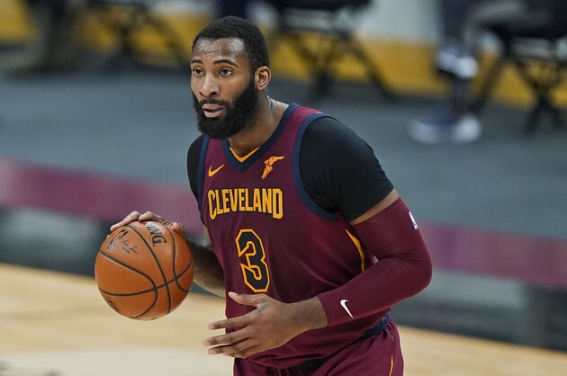 Cleveland Cavaliers' Andre Drummond drives the second half of an NBA basketball game against the Milwaukee Bucks, Friday, Feb. 5, 2021, in Cleveland. (AP Photo/Tony Dejak)