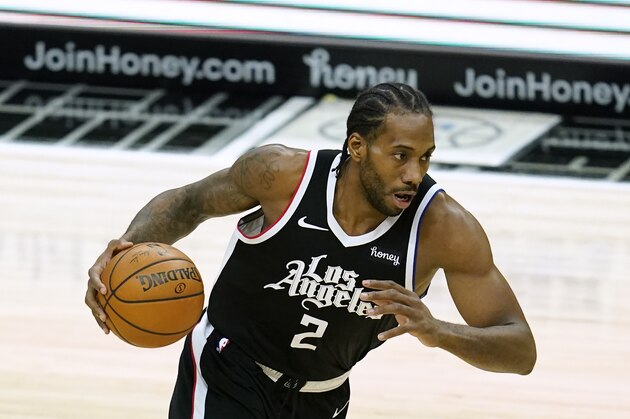 Los Angeles Clippers forward Kawhi Leonard (2) controls the ball during the third quarter of an NBA basketball game against the Indiana Pacers Sunday, Jan. 17, 2021, in Los Angeles. (AP Photo/Ashley Landis)