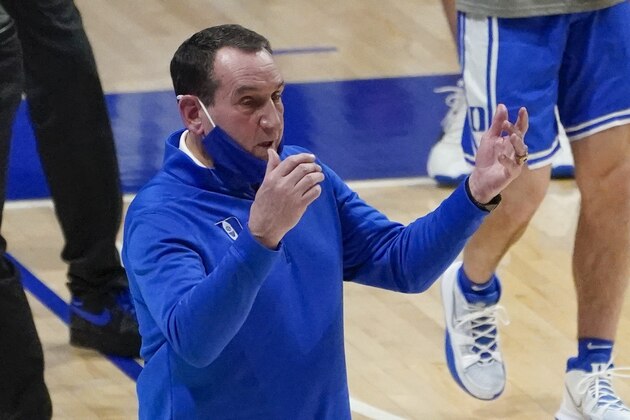 Duke coach Mike Krzyzewski calls to players during the first half of the team's NCAA college basketball game against Pittsburgh, Tuesday, Jan. 19, 2021, in Pittsburgh. (AP Photo/Keith Srakocic)