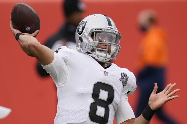 Las Vegas Raiders quarterback Marcus Mariota (8) warms up before an NFL football gameagainst the Denver Broncos, Sunday, Jan. 3, 2021, in Denver. (AP Photo/David Zalubowski)