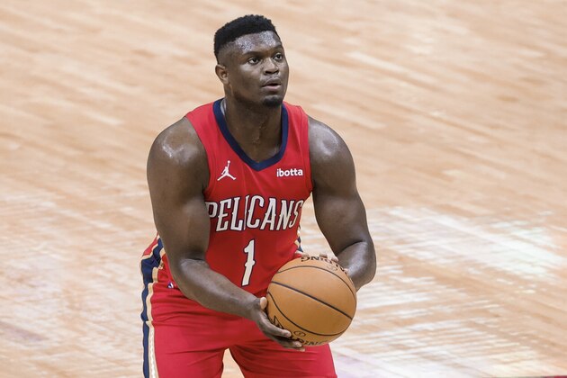 New Orleans Pelicans forward Zion Williamson (1) shoots a free throw against the Memphis Grizzlies in the first quarter of an NBA basketball game in New Orleans, Saturday, Feb. 6, 2021. (AP Photo/Derick Hingle)