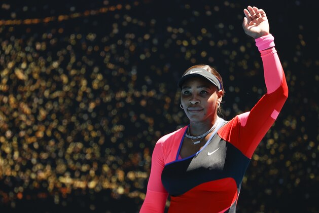 United States' Serena Williams waves after defeating Serbia's Nina Stojanovic in their second round match at the Australian Open tennis championship in Melbourne, Australia, Wednesday, Feb. 10, 2021.(AP Photo/Rick Rycroft)