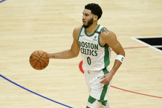 Boston Celtics forward Jayson Tatum (0) dribbles against the Los Angeles Clippers during the first half of an NBA basketball game Friday, Feb. 5, 2021, in Los Angeles. (AP Photo/Marcio Jose Sanchez) Boston Celtics forward Jayson Tatum (0) dribbles against the Los Angeles Clippers during the first half of an NBA basketball game Friday, Feb. 5, 2021, in Los Angeles. (AP Photo/Marcio Jose Sanchez)