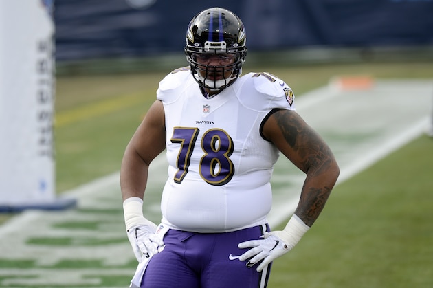 Baltimore Ravens offensive tackle Orlando Brown (78) warms up before an NFL wild-card playoff football game against the Tennessee Titans Sunday, Jan. 10, 2021, in Nashville, Tenn. (AP Photo/Mark Zaleski)