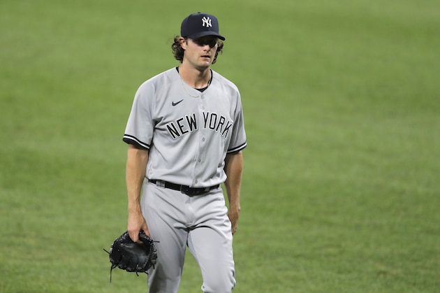 New York Yankees starting pitcher Gerrit Cole heads to the dugout after pitching to the Baltimore Orioles during the fifth inning of a baseball game, Wednesday, July 29, 2020, in Baltimore. The Yankees won 9-3. (AP Photo/Julio Cortez)