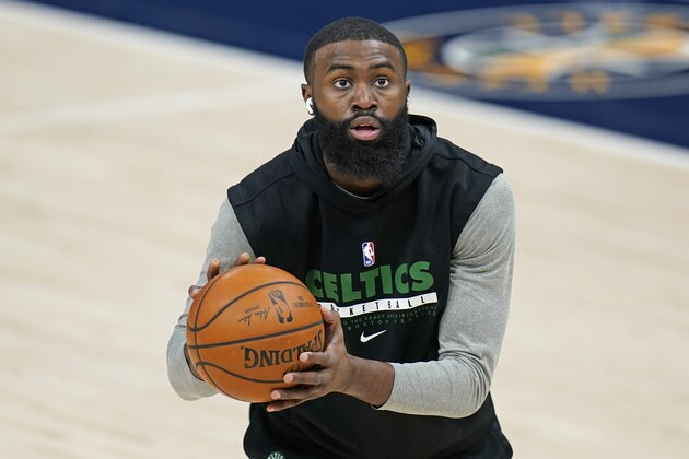 Boston Celtics Jaylen Brown warms up before their NBA basketball game against the Utah Jazz Tuesday, Feb. 9, 2021, in Salt Lake City. (AP Photo/Rick Bowmer)