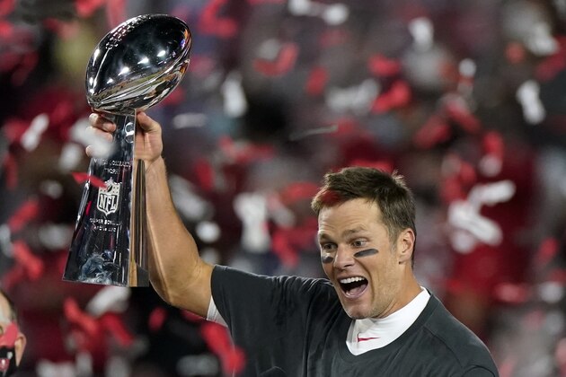 Tampa Bay Buccaneers quarterback Tom Brady celebrates with the Vince Lombardi Trophy after their NFL Super Bowl 55 football game against the Kansas City Chiefs, Sunday, Feb. 7, 2021, in Tampa, Fla. The Buccaneers defeated the Chiefs 31-9 to win the Super Bowl. (AP Photo/Gregory Bull)