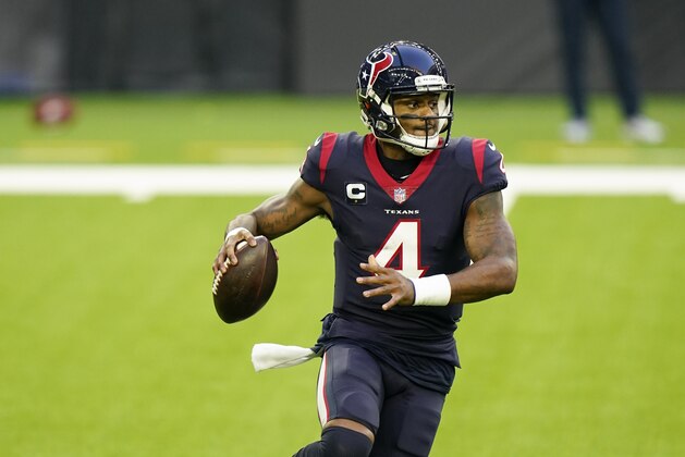 Houston Texans quarterback Deshaun Watson (4) rolls out as he looks to pass during an NFL football game against the Tennessee Titans, Sunday, Jan. 3, 2021, in Houston. (AP Photo/Matt Patterson)