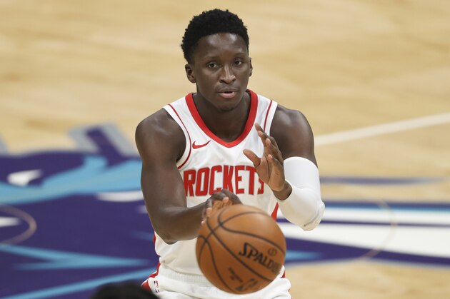 Houston Rockets guard Victor Oladipo passes against the Charlotte Hornets in the first half of an NBA basketball game in Charlotte, N.C., Monday, Feb. 8, 2021. (AP Photo/Nell Redmond)