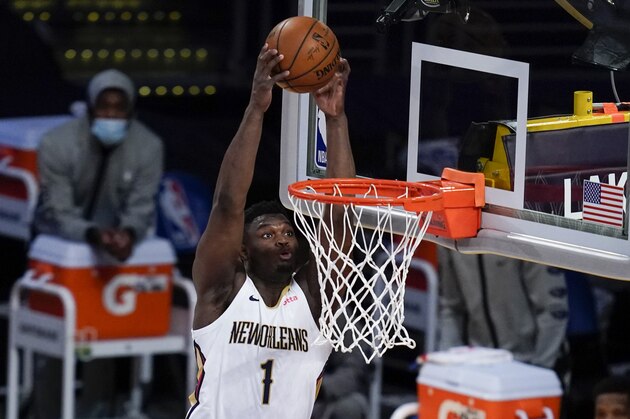 New Orleans Pelicans forward Zion Williamson (1) dunks the ball during the first quarter of an NBA basketball game against the Los Angeles Lakers Friday, Jan. 15, 2021, in Los Angeles. (AP Photo/Ashley Landis)