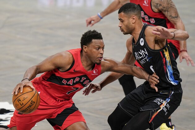 Brooklyn Nets' Timothe Luwawu-Cabarrot, right, defends against Toronto Raptors' Kyle Lowry (7) during the first half of an NBA basketball game Friday, Feb. 5, 2021, in New York. (AP Photo/Frank Franklin II)