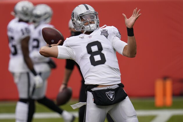 Las Vegas Raiders quarterback Marcus Mariota (8) in the first half of an NFL football game Sunday, Jan. 3, 2021, in Denver. (AP Photo/David Zalubowski)