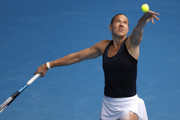 Estonia's Kaia Kanepi serves to United States' Sofia Kenin during their second round match at the Australian Open tennis championship in Melbourne, Australia, Thursday, Feb. 11, 2021.(AP Photo/Rick Rycroft)