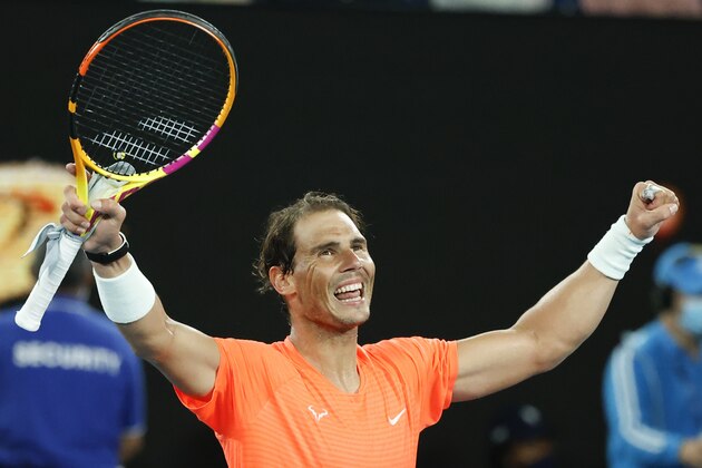 Spain's Rafael Nadal celebrates after defeating United States' Michael Mmoh during their second round match at the Australian Open tennis championship in Melbourne, Australia, Thursday, Feb. 11, 2021.(AP Photo/Rick Rycroft) Spain's Rafael Nadal celebrates after defeating United States' Michael Mmoh during their second round match at the Australian Open tennis championship in Melbourne, Australia, Thursday, Feb. 11, 2021.(AP Photo/Rick Rycroft)