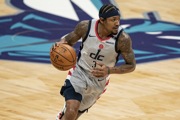 Washington Wizards guard Bradley Beal (3) brings the ball up court against the Charlotte Hornets during an NBA basketball game in Charlotte, N.C., Sunday, Feb. 7, 2021. (AP Photo/Jacob Kupferman)