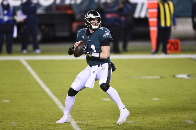 Philadelphia Eagles' Carson Wentz passes during the first half of an NFL football game against the Seattle Seahawks, Monday, Nov. 30, 2020, in Philadelphia. (AP Photo/Derik Hamilton)