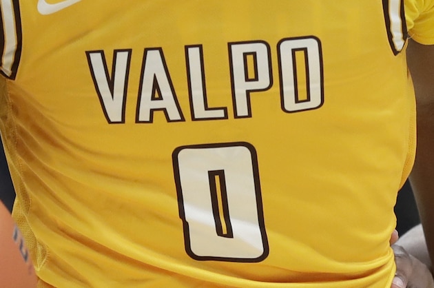 Valparaiso's Javon Freeman-Liberty (0) drives past Missouri State's Ja'Monta Black during the first half of an NCAA college basketball game in the semifinal round of the Missouri Valley Conference men's tournament Saturday, March 7, 2020, in St. Louis. (AP Photo/Jeff Roberson)