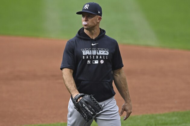 New York Yankees' Brett Gardner blows a bubble during batting practice before Game 2 of the team's American League wild-card baseball playoff series against the Cleveland Indians, Wednesday, Sept. 30, 2020, in Cleveland. (AP Photo/David Dermer)