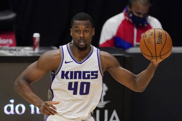 Sacramento Kings forward Harrison Barnes passes the ball during the second half of an NBA basketball game against the Los Angeles Clippers Sunday, Feb. 7, 2021, in Los Angeles. The Kings won 113-110. (AP Photo/Mark J. Terrill)
