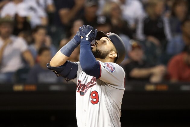Minnesota Twins' Marwin Gonzalez celebrates his home run off Chicago White Sox starting pitcher Lucas Giolito during the second inning of a baseball game Tuesday, Aug. 27, 2019, in Chicago. (AP Photo/Charles Rex Arbogast)