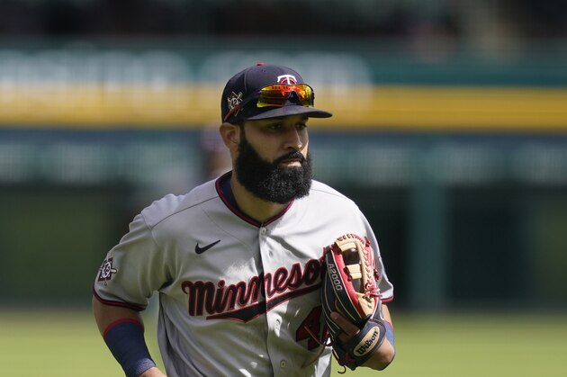 Minnesota Twins left fielder Marwin Gonzalez runs to the dugout during the seventh inning of a baseball game, Sunday, Aug. 30, 2020, in Detroit. (AP Photo/Carlos Osorio)