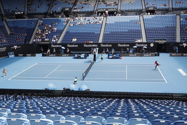 United States' Serena Williams, right, serves to Russia's Anastasia Potapova during their third round match on Rod Laver Arena at the Australian Open tennis championship in Melbourne, Australia, Friday, Feb. 12, 2021.(AP Photo/Rick Rycroft)