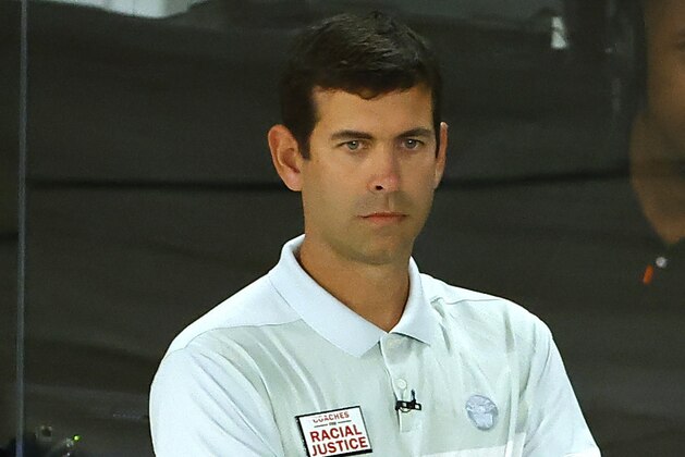 Head coach Brad Stevens of the Boston Celtics looks on against the Philadelphia 76ers during the first half of Game 2 of an NBA basketball first-round playoff series, Wednesday, Aug. 19, 2020, in Lake Buena Vista, Fla. (Kevin C. Cox/Pool Photo via AP)