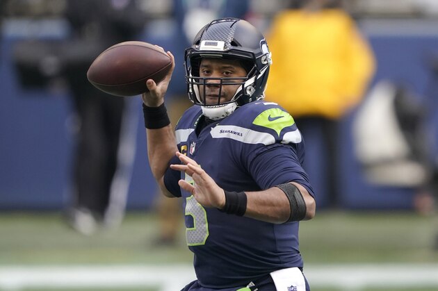 Seattle Seahawks quarterback Russell Wilson (3) in action against the Los Angeles Rams during an NFL wild-card playoff football game, Saturday, Jan. 9, 2021, in Seattle. (AP Photo/Ted S. Warren)