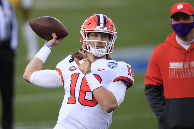 Clemson quarterback Trevor Lawrence (16) warms up before the start of the Atlantic Coast Conference championship NCAA college football game against Notre Dame, Saturday, Dec. 19, 2020, in Charlotte, N.C. (AP Photo/Brian Blanco)
