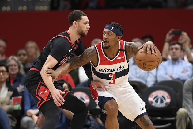 Washington Wizards guard Bradley Beal (3) dribbles the ball against Chicago Bulls guard Zach LaVine (8) during the first half of an NBA basketball game, Tuesday, Feb. 11, 2020, in Washington. (AP Photo/Nick Wass)