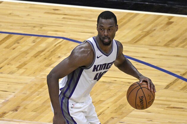Sacramento Kings forward Harrison Barnes (40) sets up a play during the second half of an NBA basketball game against the Orlando Magic, Wednesday, Jan. 27, 2021, in Orlando, Fla. (AP Photo/Phelan M. Ebenhack)