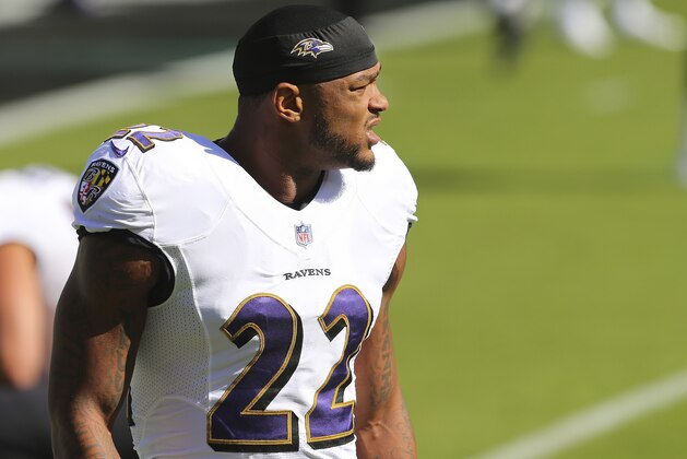 Baltimore Ravens' Jimmy Smith (22) warms up before an NFL football game against the Philadelphia Eagles, Sunday, Oct. 18, 2020, in Philadelphia. The Ravens defeated the Eagles 30-28. (AP Photo/Rich Schultz)
