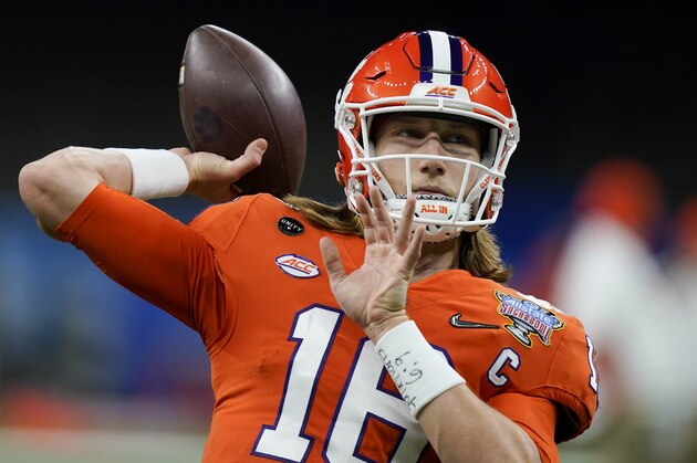 Clemson quarterback Trevor Lawrence warms up before the Sugar Bowl NCAA college football game against Ohio State Friday, Jan. 1, 2021, in New Orleans. (AP Photo/Gerald Herbert)