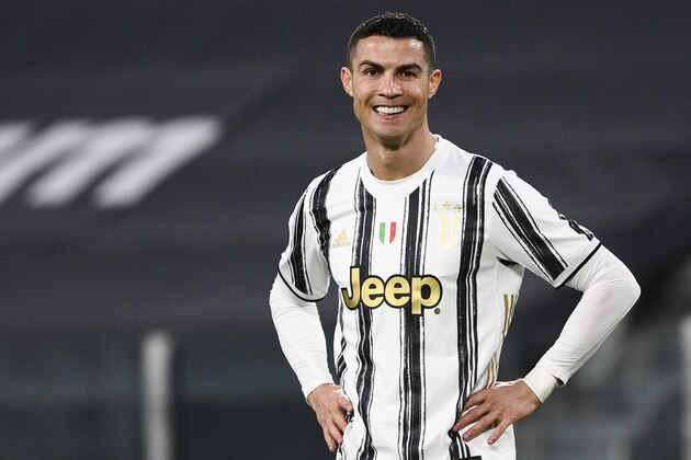 Juventus' Cristiano Ronaldo smiles during the Italian Cup, return-leg, semifinal soccer match between Juventus and Inter Milan, at the Turin Allianz Stadium, Italy, Tuesday, Feb. 9, 2021. (Marco Alpozzi/LaPresse via AP)