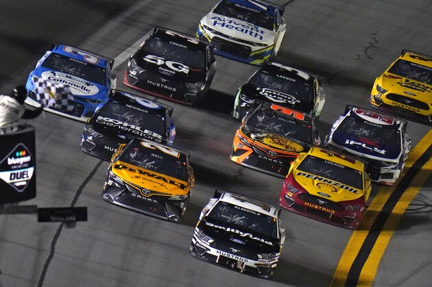 Aric Almirola (10) beats Christopher Bell (20), Ryan Newman (6) and Joey Logano (22) to the finish line to win the first NASCAR Daytona 500 duel qualifying auto race Thursday, Feb. 11, 2021, at Daytona International Speedway in Daytona Beach, Fla. (AP Photo/Chris O'Meara) Aric Almirola (10) beats Christopher Bell (20), Ryan Newman (6) and Joey Logano (22) to the finish line to win the first NASCAR Daytona 500 duel qualifying auto race Thursday, Feb. 11, 2021, at Daytona International Speedway in Daytona Beach, Fla. (AP Photo/Chris O'Meara)